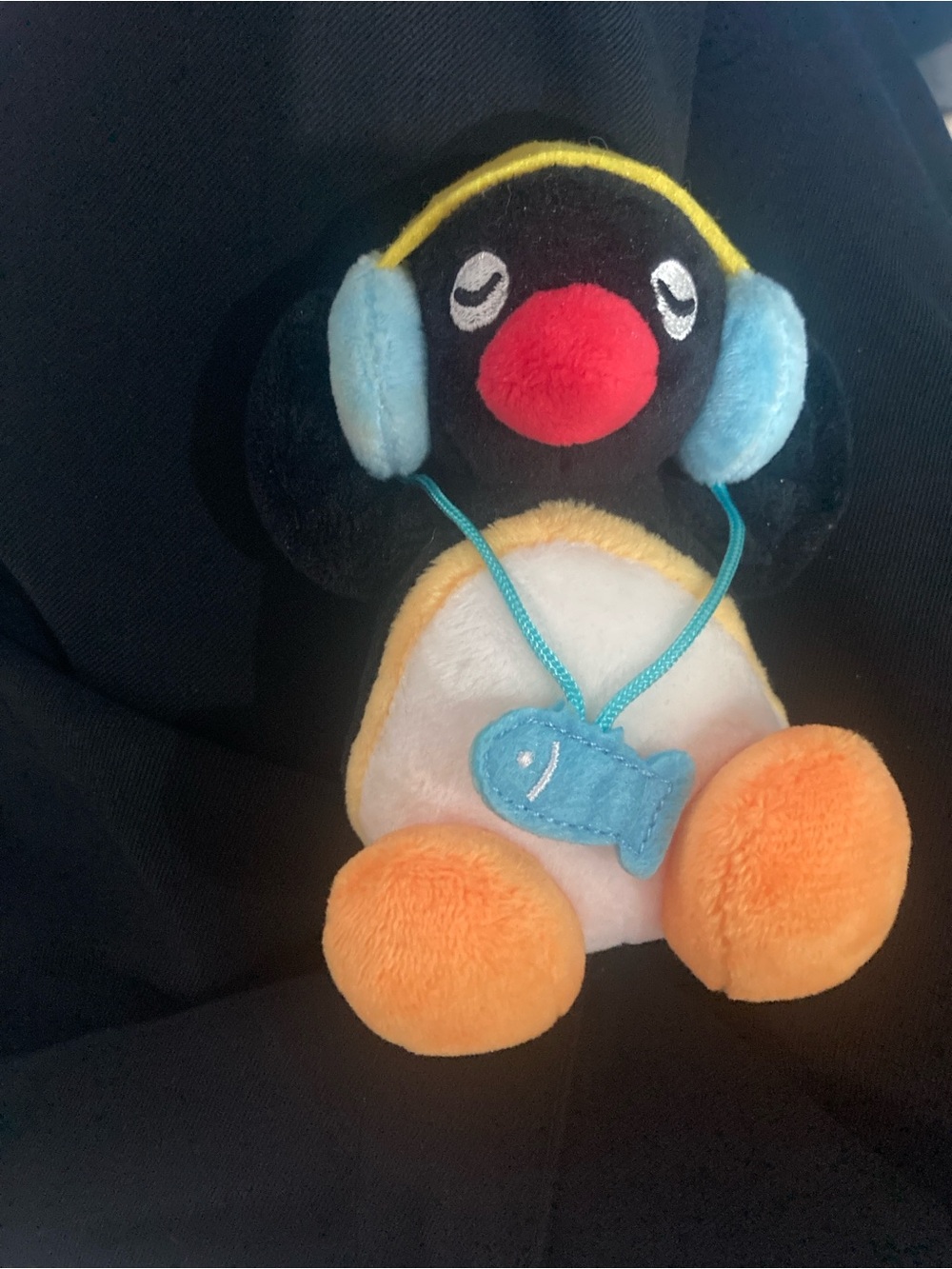 Plush Penguin Hair Accessory with Blue Headphones and Orange Feet